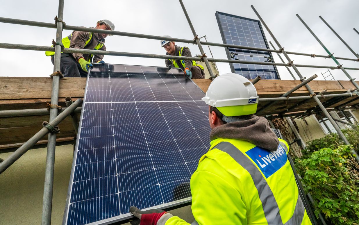 Solar panels being put on an existing home.