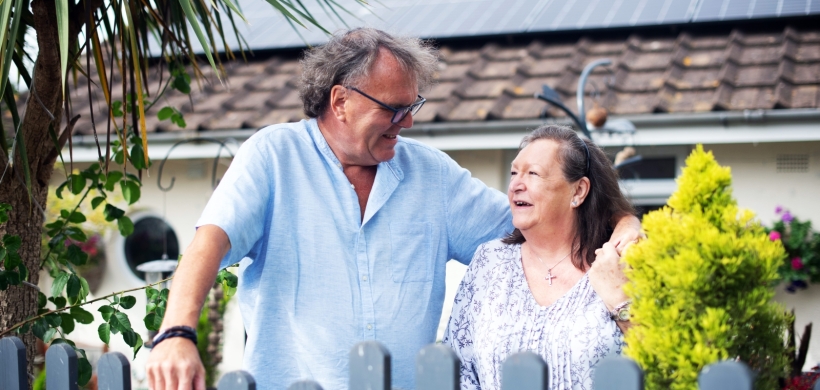 Peter and Anita outside their home in Devon.