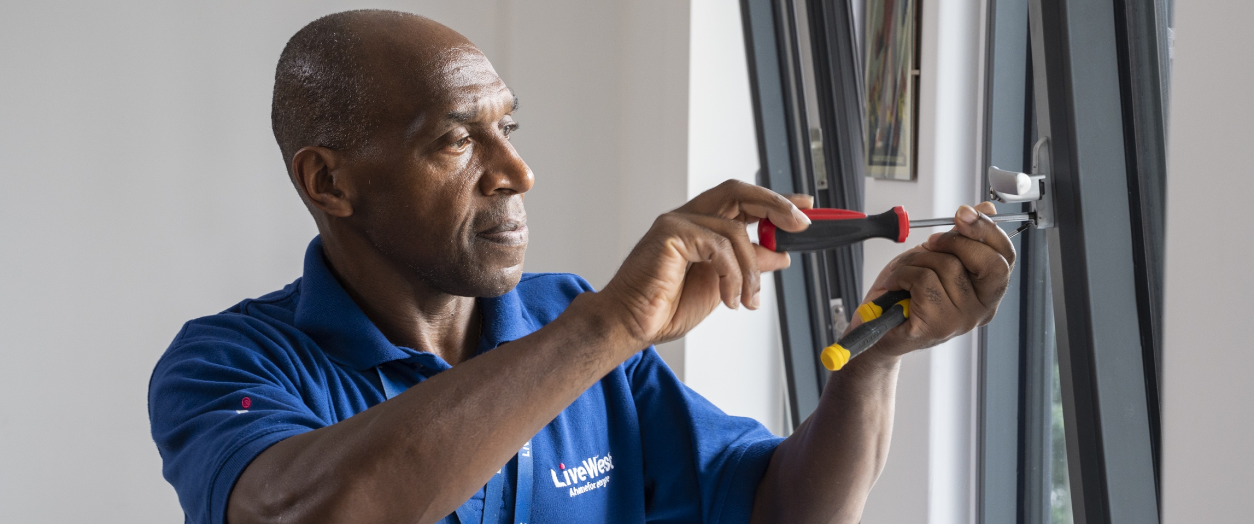 LiveWest colleague repairing Bristol Foyer