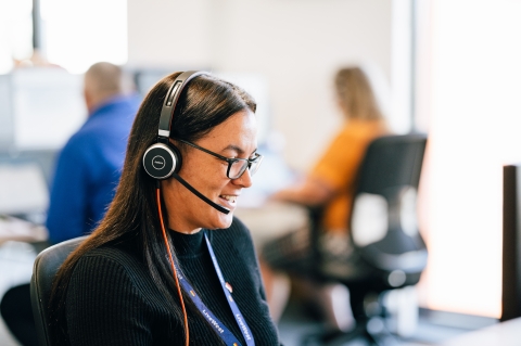 Photo of a LiveWest colleague on the phone. 