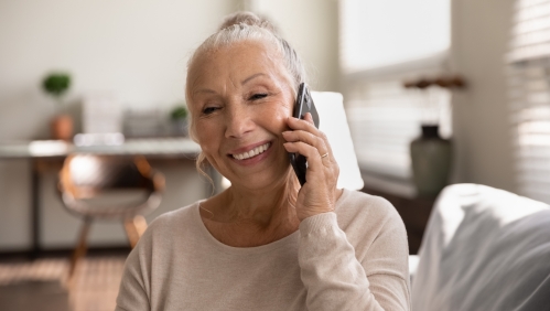 Lady speaking on the phone. 