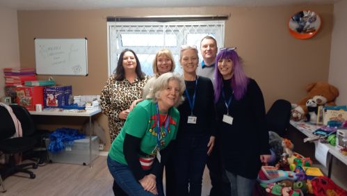 Volunteers at a toy swap. 